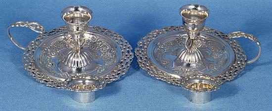 A nice pair of Victorian silver pierced chamber sticks, Diameter 4 ½”/115mm Height 2 ½”/64mm, Total weight 8.1oz/230 grms